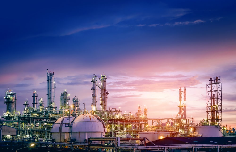 oil-gas-refinery-plant-petrochemical-industry-sky-sunset-factory-with-evening-manufacturing-petrochemical-industrial-min